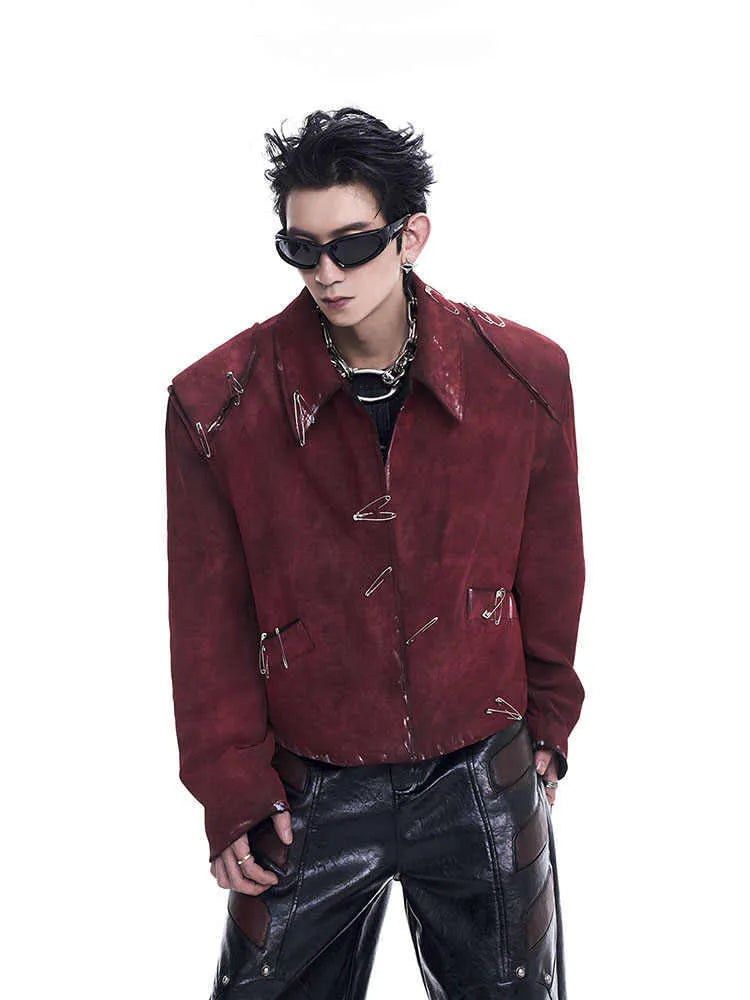 Red men's loose-fit quilted jacket with lapel collar and decorative pin flocking detail.