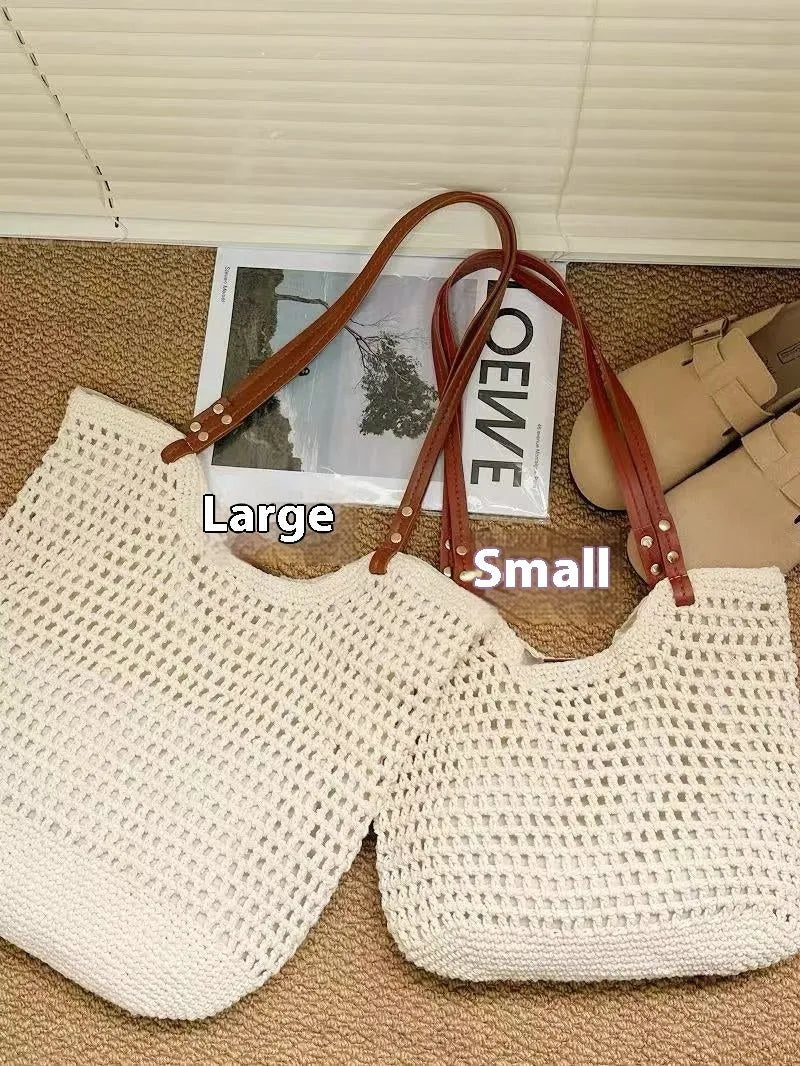 Beige woven cotton linen shoulder bag with a large main compartment.