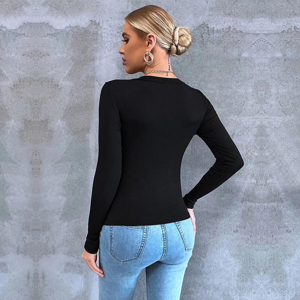 Black women's long sleeve slim fit cropped T-shirt with split neck and slit detail, sizes XS-XL