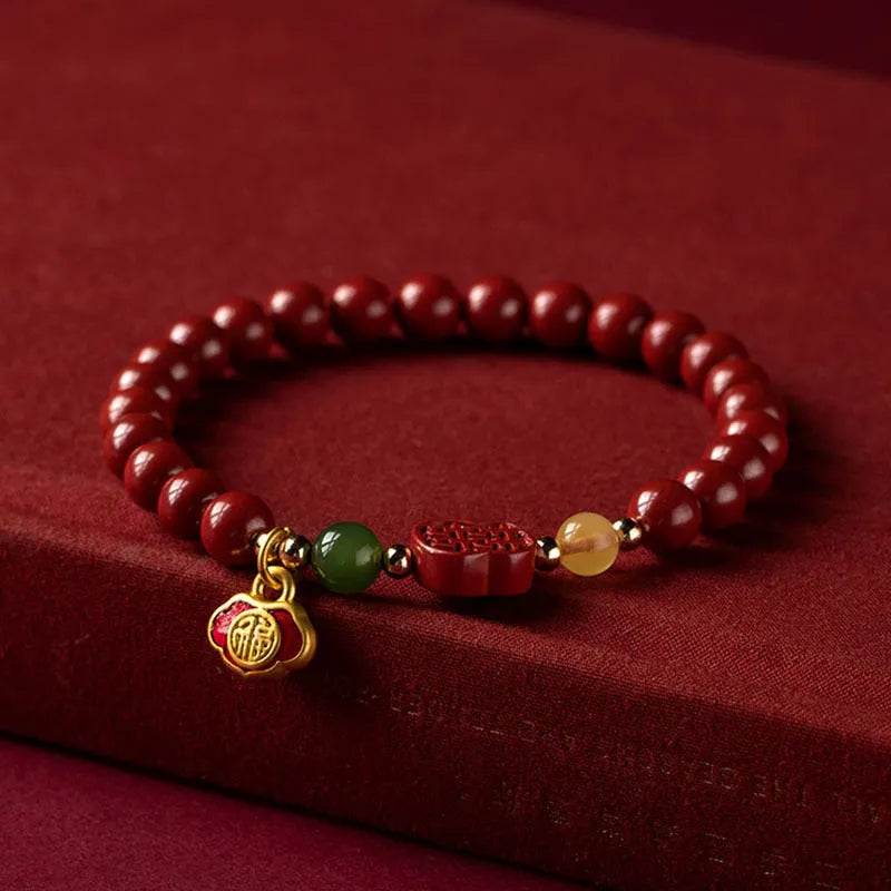 Emperor Sandstone Happy Eyebrow Bracelet with fu character design on cinnabar beads