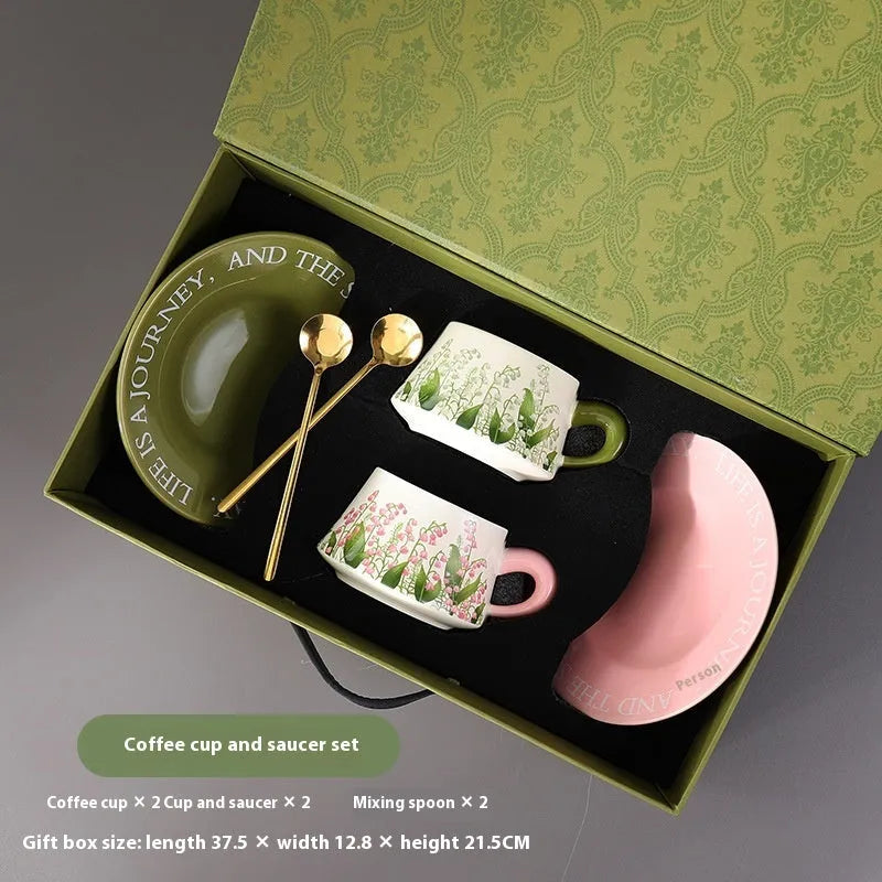 Ceramic coffee cup and saucer set for couples with two cups, saucers, and spoons