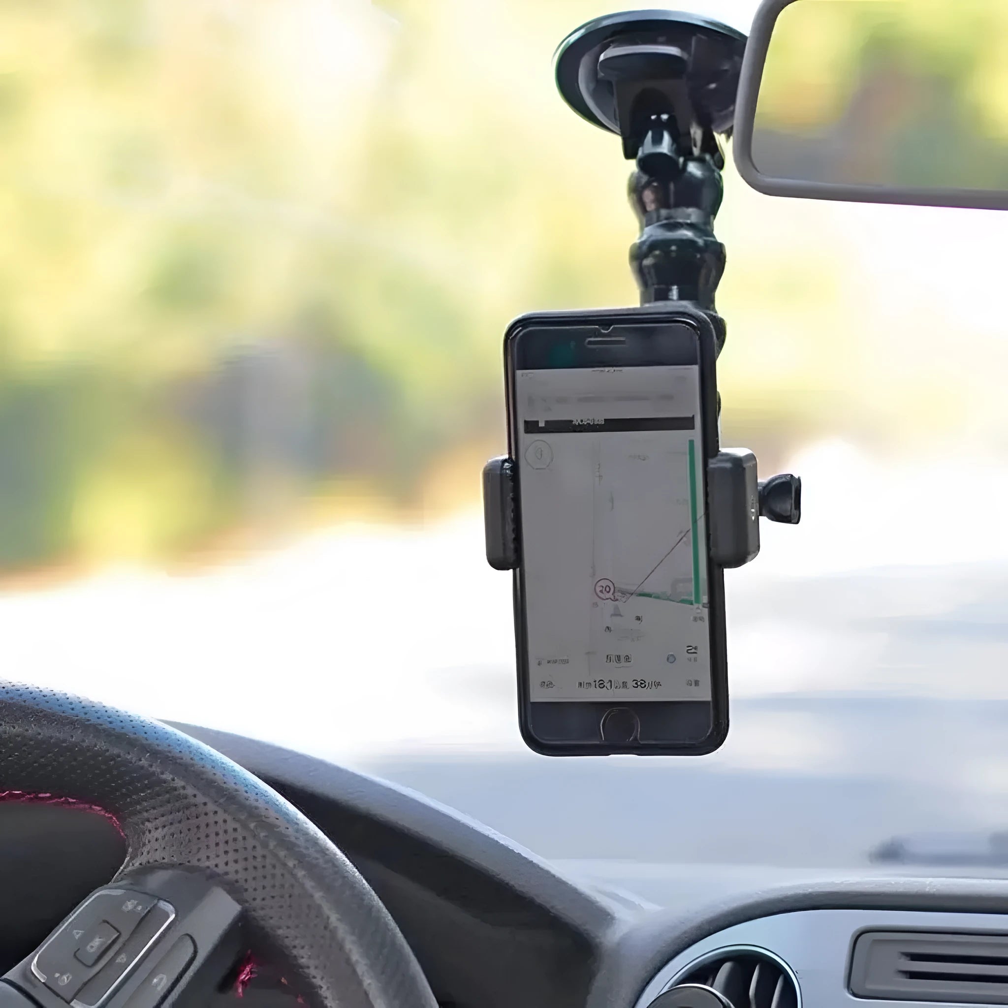 Black plastic car shooting bracket mobile phone holder with seven-section support frame for stable phone holding.