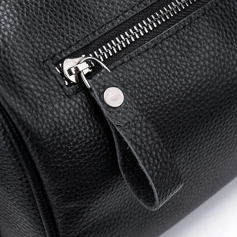 Black genuine leather one-shoulder crossbody bag with adjustable strap