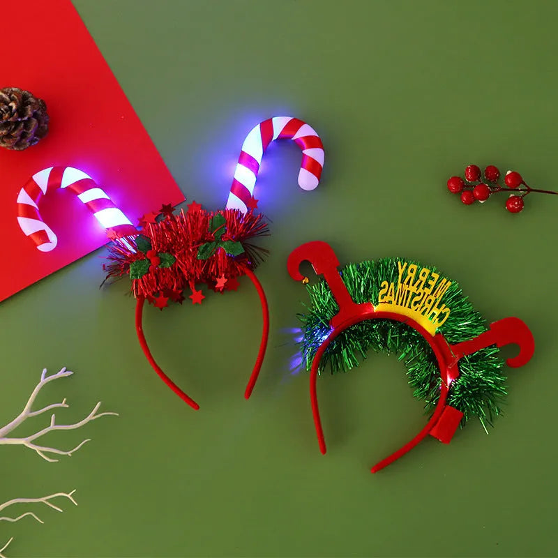 Christmas LED hair band with flashing lights, plastic headband in festive motifs including tree, snowflake, and deer horn designs