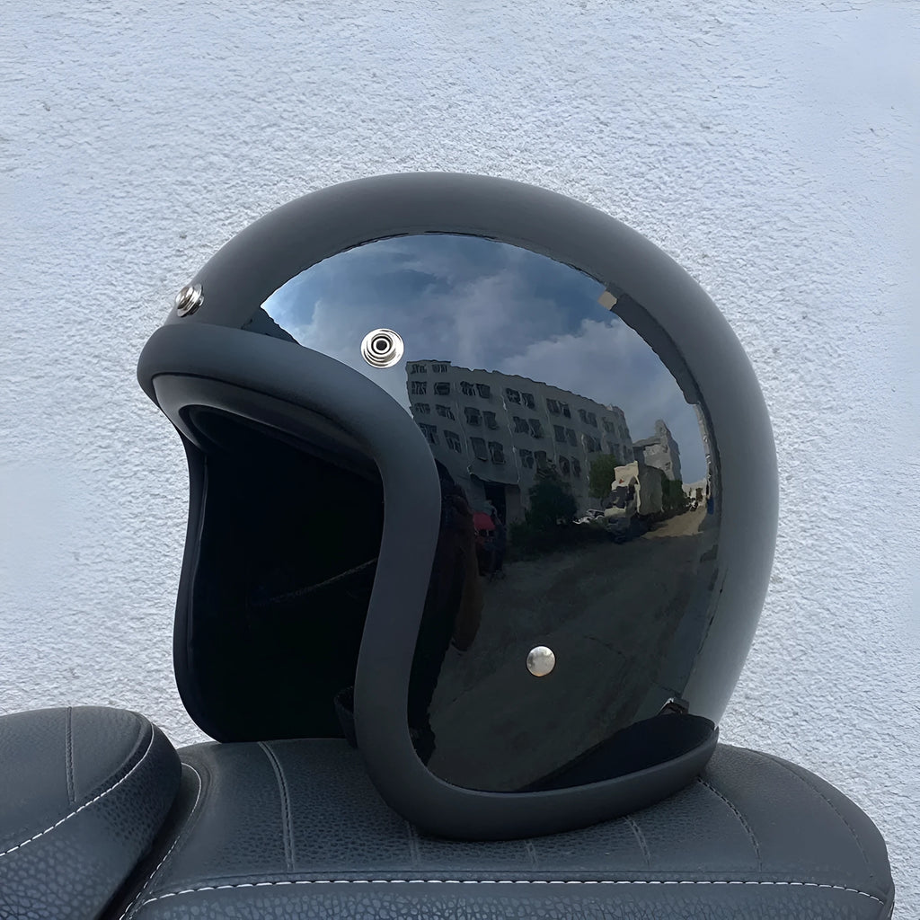 Cement Grey retro open-face motorcycle helmet with clear visor on a plain background.