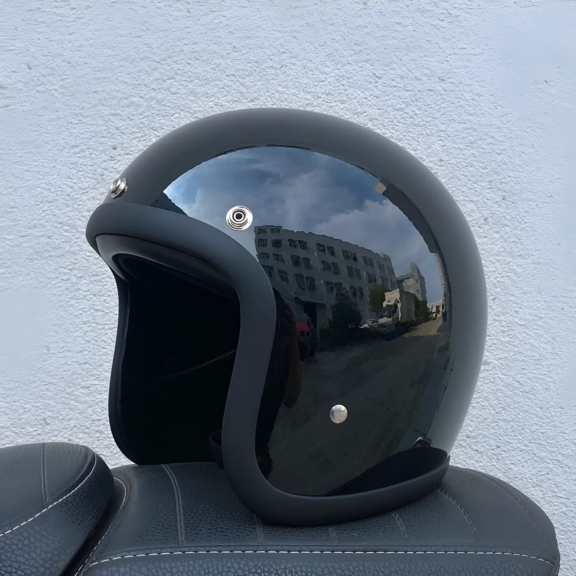 Cement Grey retro open-face motorcycle helmet with clear visor on a plain background.