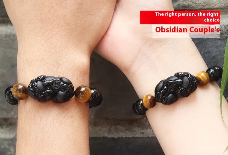 Black Mexico Gold Sheen Obsidian crystal bracelet with Pi Xiu charm, showing different bead size options.