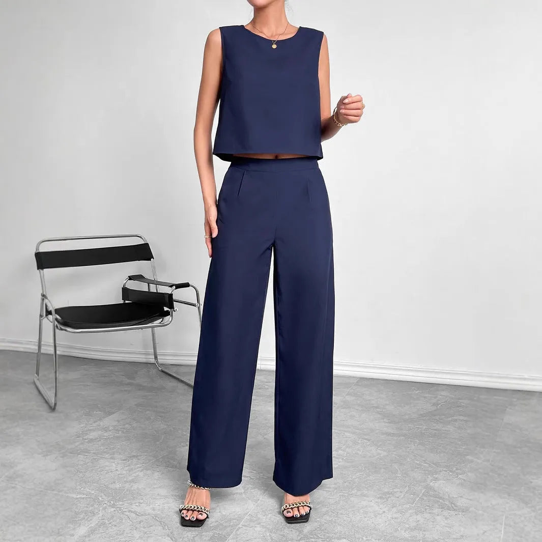 Women's red sleeveless top and wide leg pants two-piece casual set on a hanger.