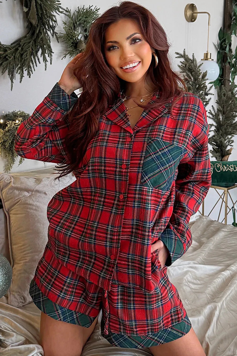 Red plaid long sleeve shirt and shorts Christmas pajama set with contrast patch details.