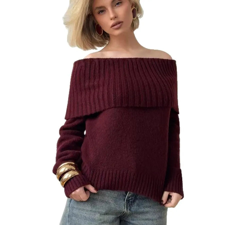 Grey off-the-shoulder women's sweater with a 3D knit pattern and strapless neckline on a hanger.