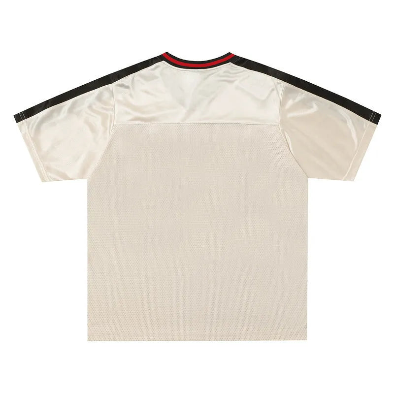 Apricot coloured V-neck sports jersey with letter pattern print and drop-shoulder sleeves