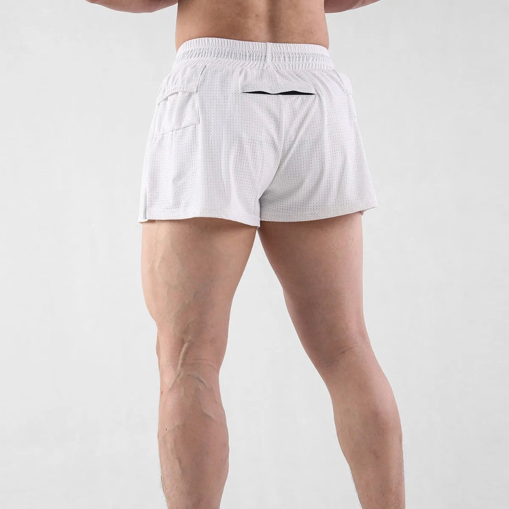 Man wearing black quick-drying nylon summer shorts in a sports leisure style.
