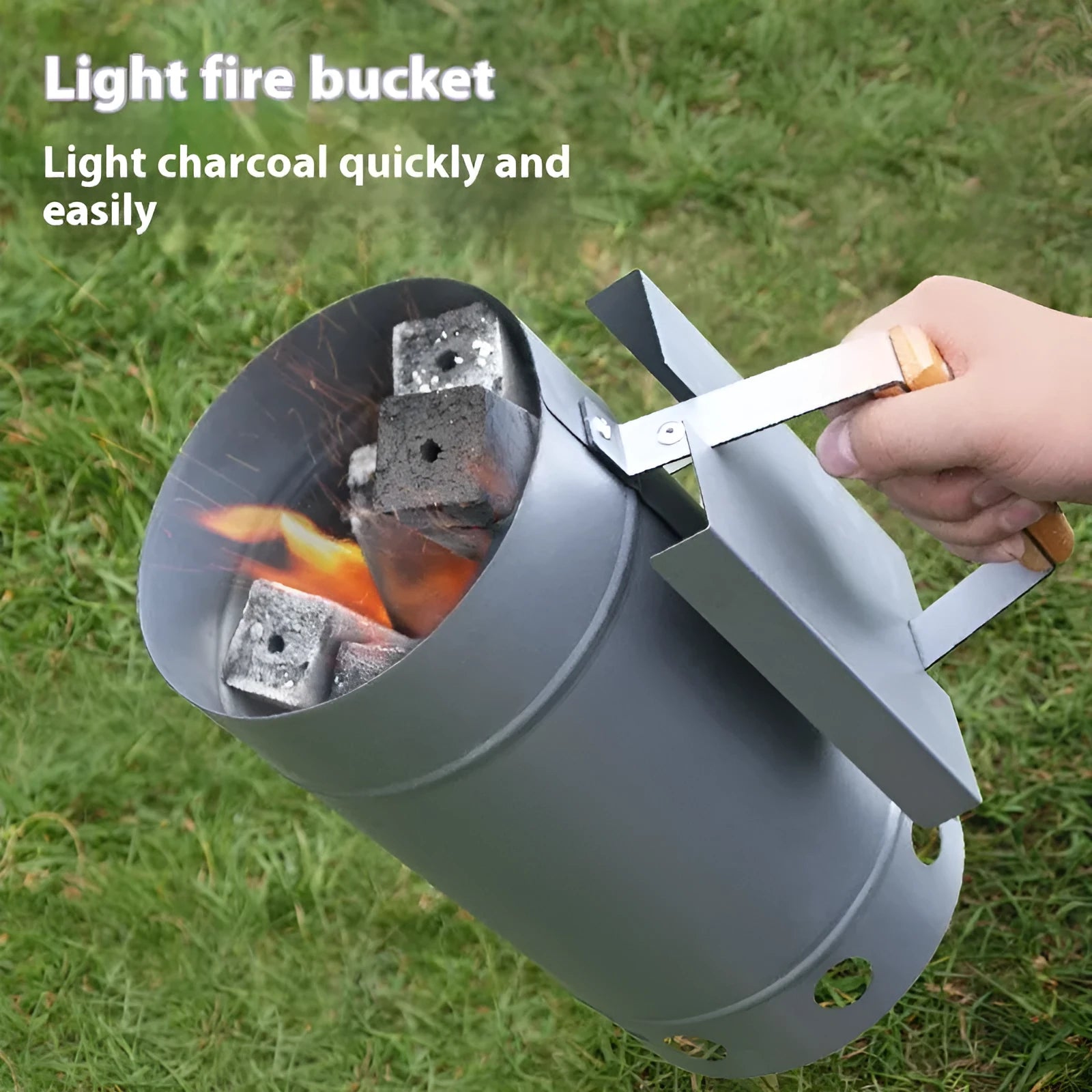 Zinc-iron alloy charcoal barbecue oven igniter with pointed carbon barrel design on a garden table.
