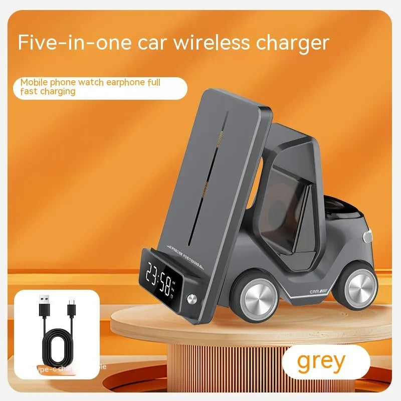 Grey 3-in-1 wireless charging bracket holding a phone, smartwatch, and earbud case on a desk.