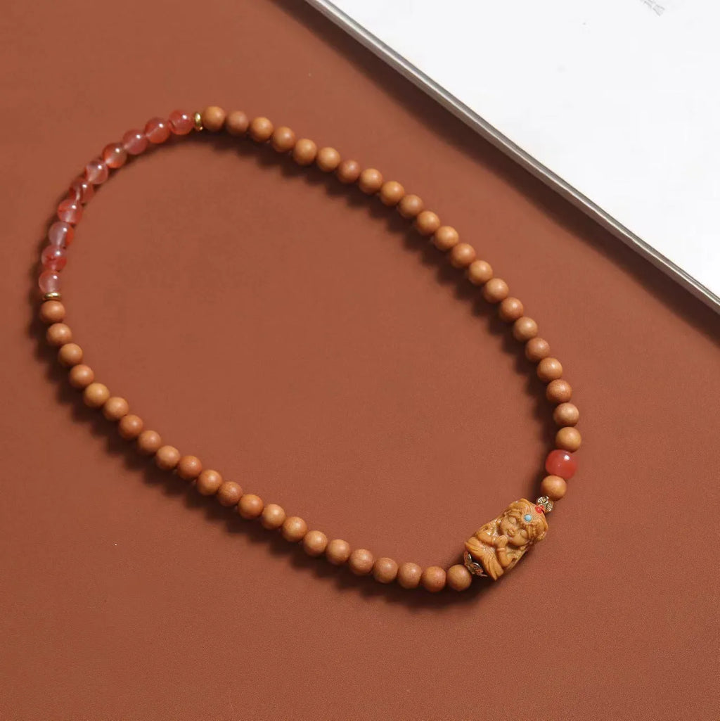 Brown wooden bracelet with double circle design featuring 6mm round beads in traditional weaving style