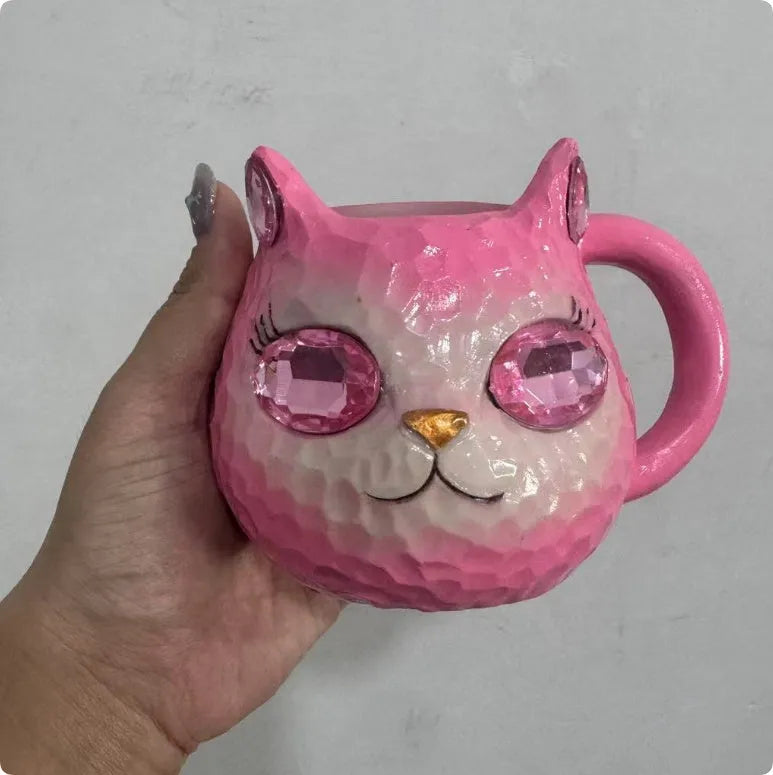 American-style cat cup resin craft ornament in purple, green, blue, and pink colours.