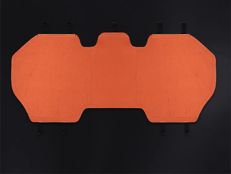 Ultra thin leather car seat cover with gradient drilling holes in Hermes Orange colour on a standard car seat.
