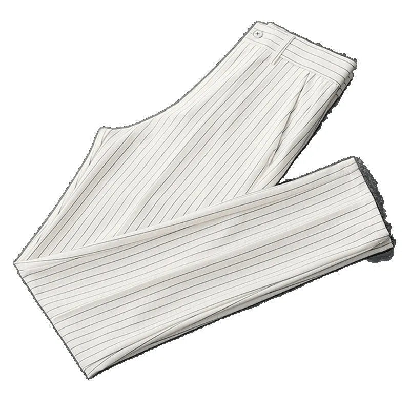 Men's thin striped loose suit pants with draping fit in black and white colours.