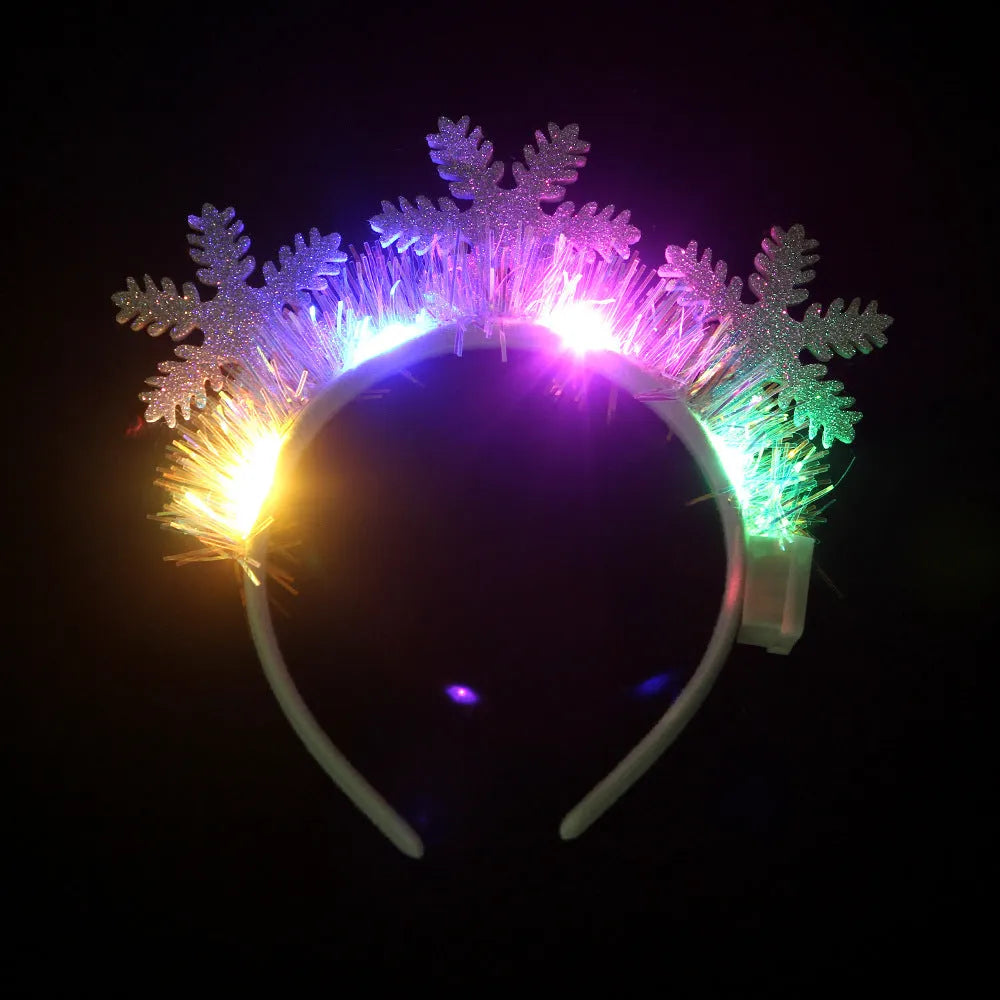 Christmas LED hair band with flashing lights, plastic headband in festive motifs including tree, snowflake, and deer horn designs