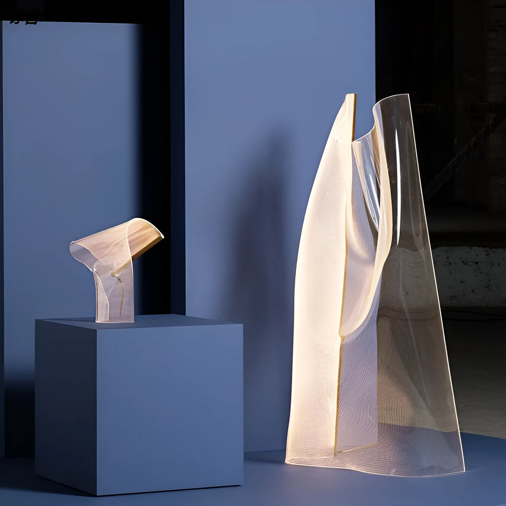 Acrylic irregular ribbon table lamp with warm light on bedside table 360x480mm