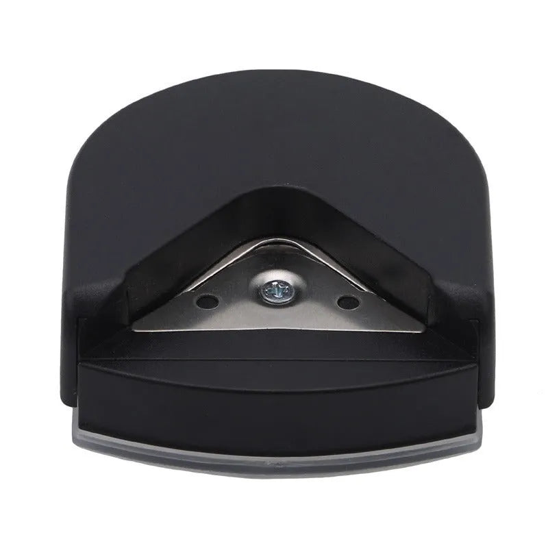 Black plastic and metal business card corner cutter for rounding photo edges.