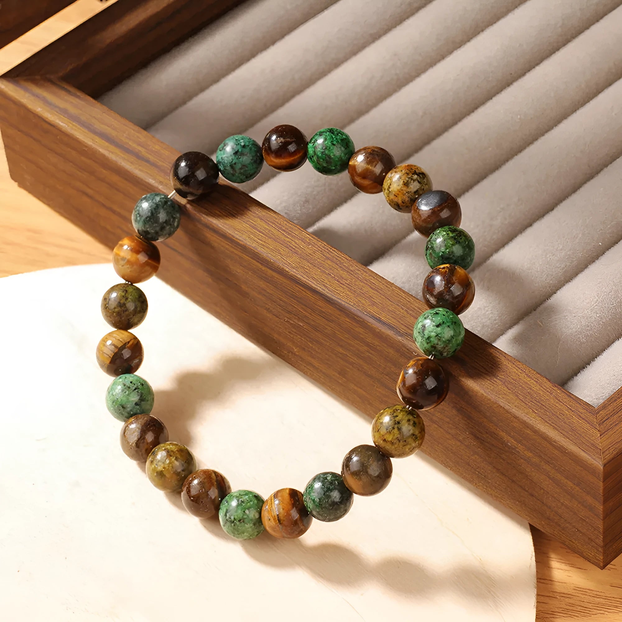 Handmade Tigereye fortune bracelet with natural stone and antique flower design in L1805 colour.