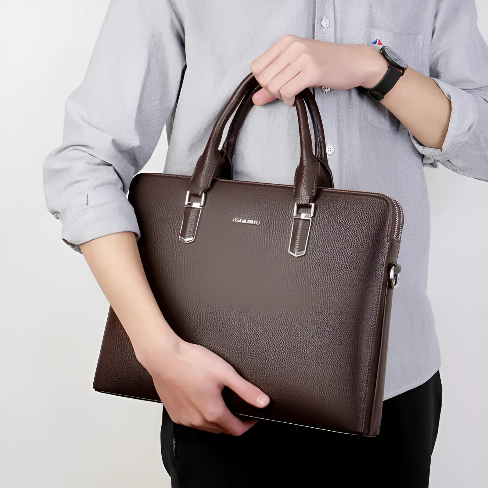 Men's PU leather handbag with litchi pattern, double pull opening, and telescopic handle in black and brown colours