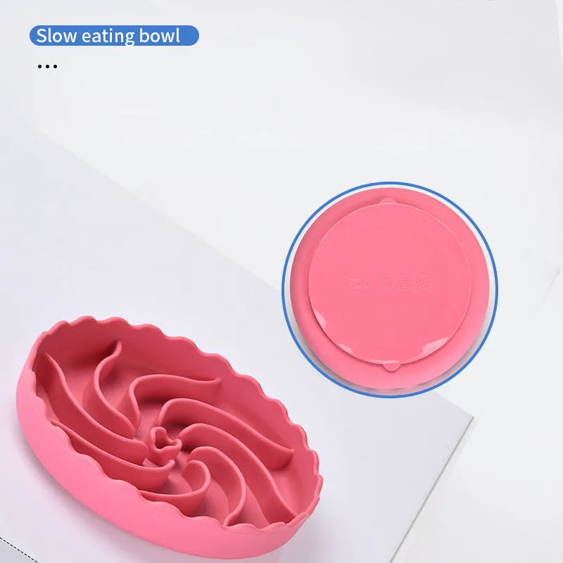 Food-grade silicone slow feeder dog bowl in blue with suction cup base and raised maze ridges