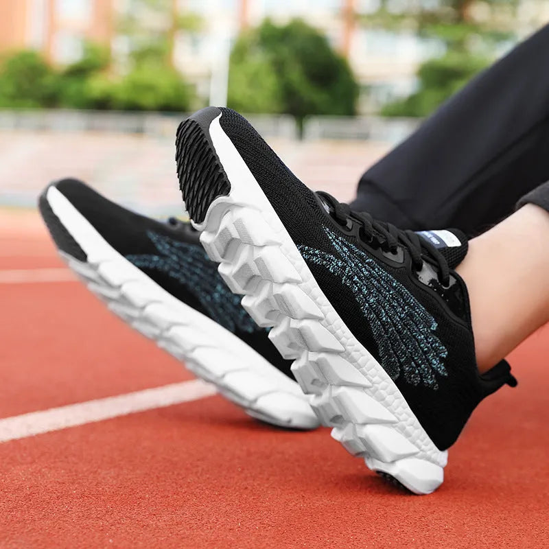 Low-top black and white running sneaker with cross strap and round toe on MD sole.