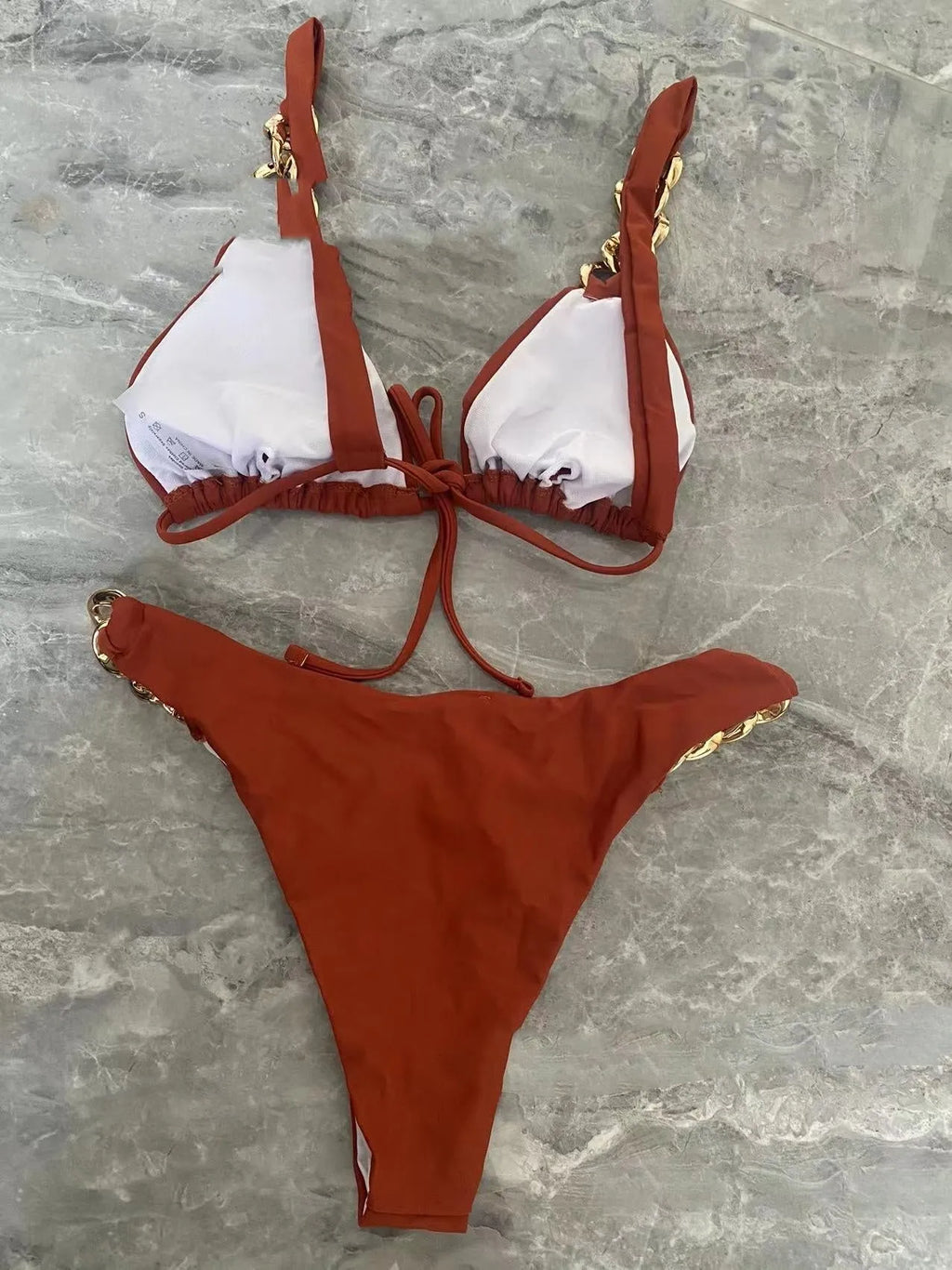 Brown women's tube-top bikini with adjustable ring-tether straps and push up padding.