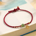 Handmade women's 925 silver and Hetian jade woven bracelet with red carrying strap