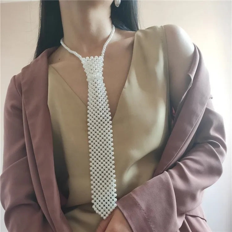 Pearl tie body chain with hollow out design and imitation pearl details in retro style