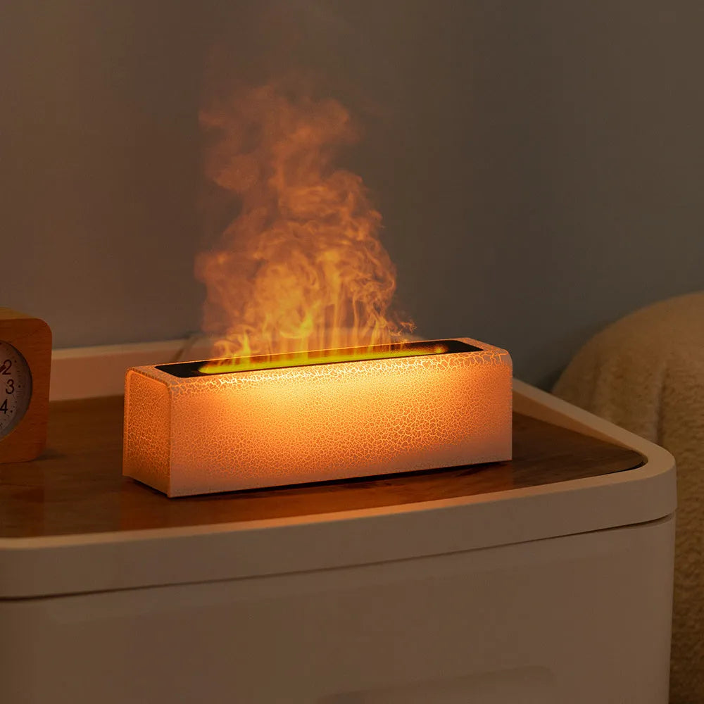 USB lava flame humidifier in black or white with colourful simulated flame and aromatherapy function on a desktop