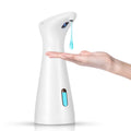 White infrared sensor automatic soap dispenser on a bathroom sink
