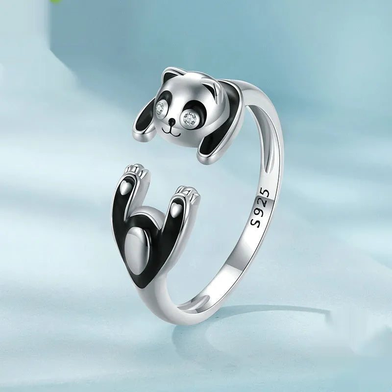 Adjustable sterling silver panda open ring bracelet with white gold plating on model finger