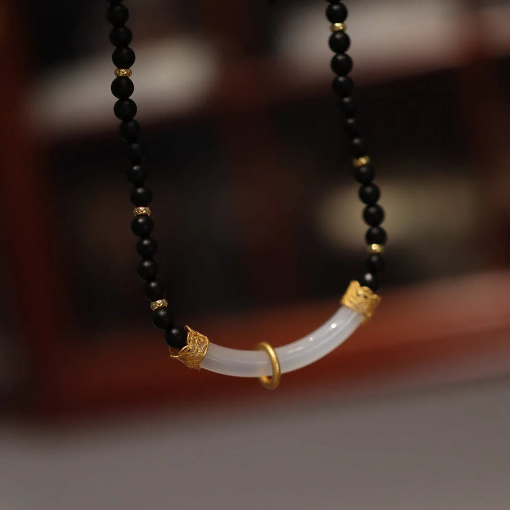 Matte black agate and white chalcedony necklace with 925 silver pendant in Chinese U-shaped design