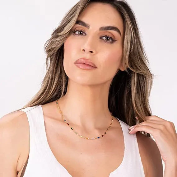 Geometric glass crystal necklace on adjustable alloy chain showing material contrasts