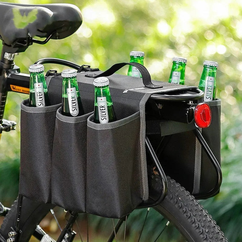 Black and blue orange double-sided bicycle handlebar drink storage bag mounted on bike.