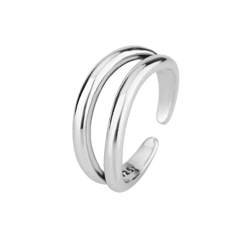 Women's retro copper double layer hollow geometry ring with adjustable opening.