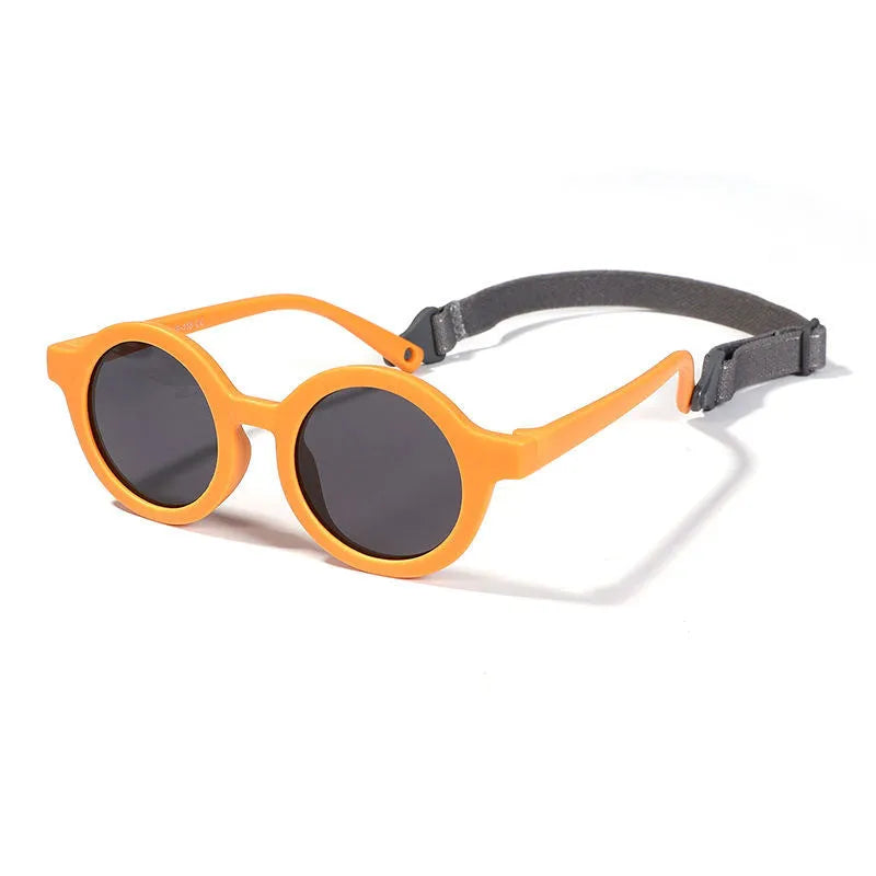 Children's silicone sunglasses for 0-3 year olds with round frame and polarized lenses in multiple colour options