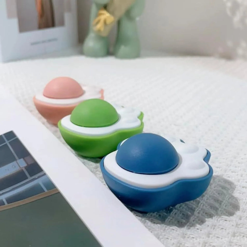 Blue, green, and pink edible vine catnip balls for cats, shown as dental chew and play toys.