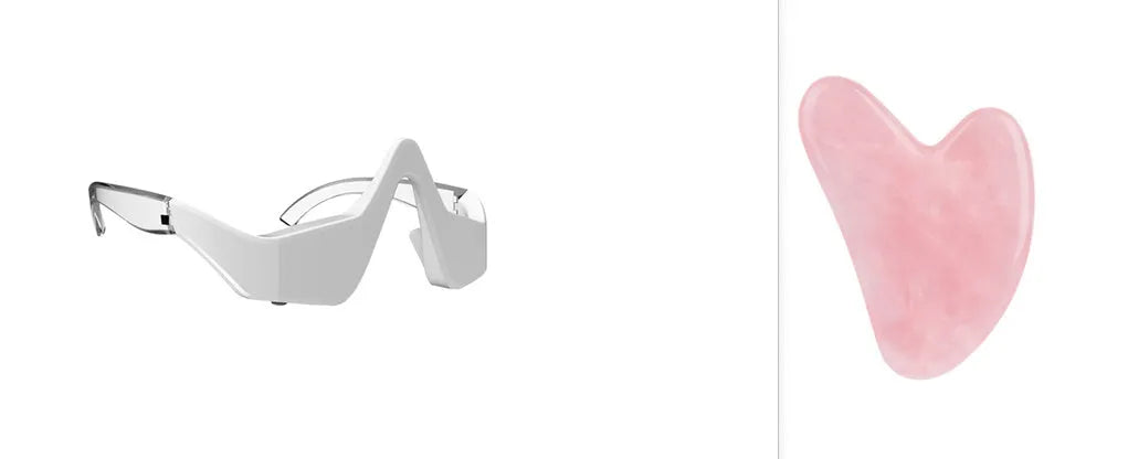 Pink and white 3D micro-current eye massager shaped like glasses on a grey background.