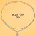 Gold or silver rhinestone waist chain with a water drop pendant and tassel detail