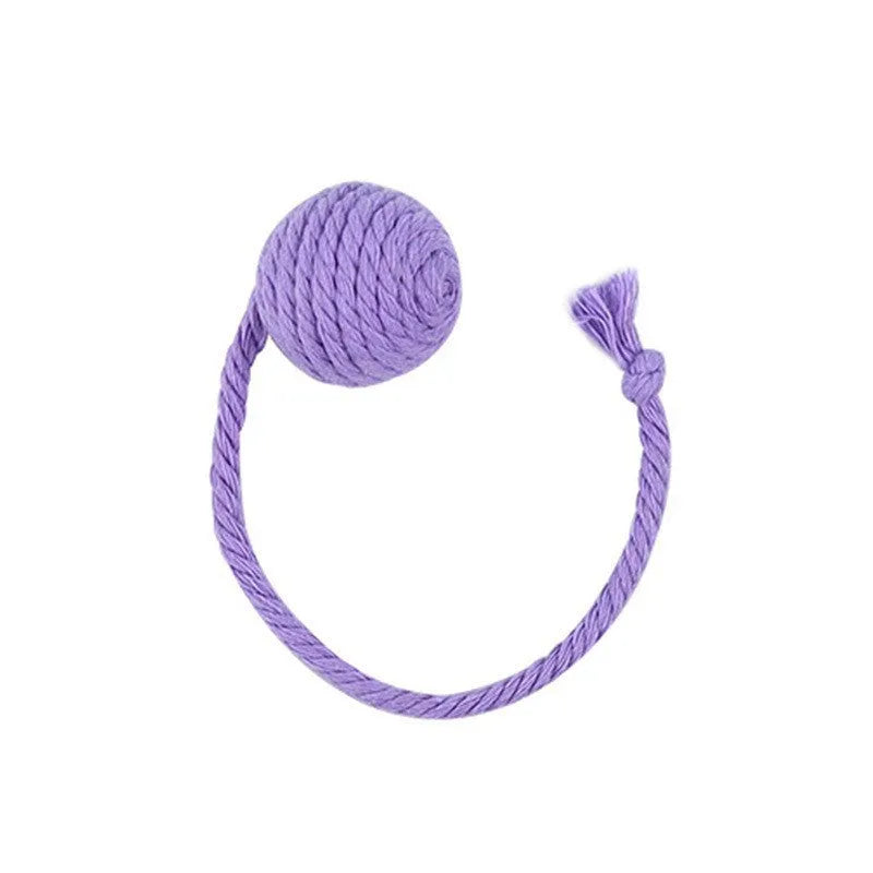 Colourful cat toy ball with an attached rope and built-in bell for kittens, shown in green, pink, purple, and yellow.
