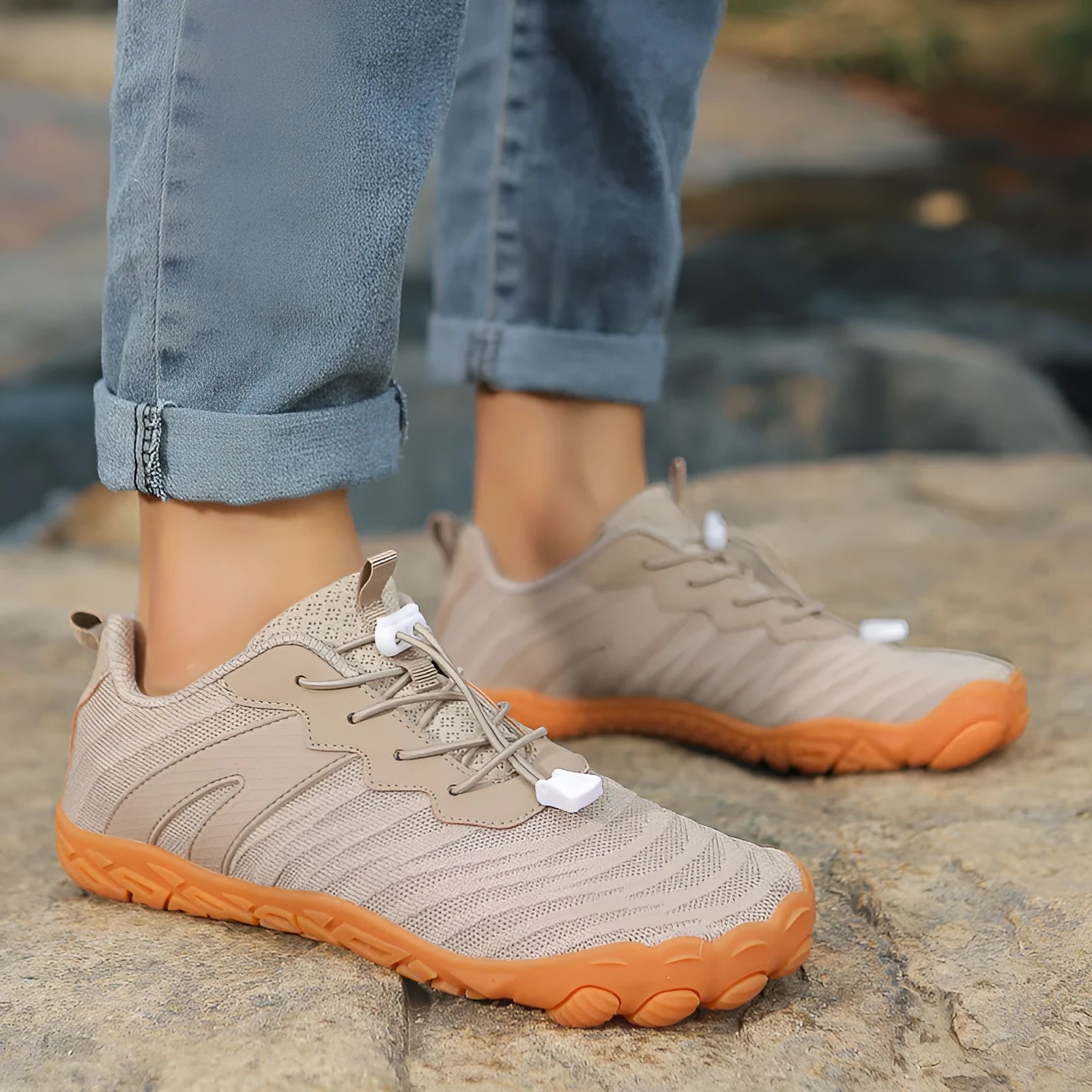 Low-top outdoor hiking shoes with mesh lining and rubber sole in multiple colours.