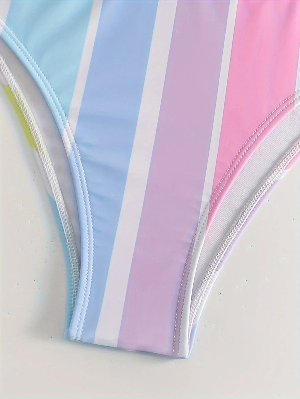 Women's striped two-piece bikini set in briefs style, shown in picture colour, for swimming and sports.