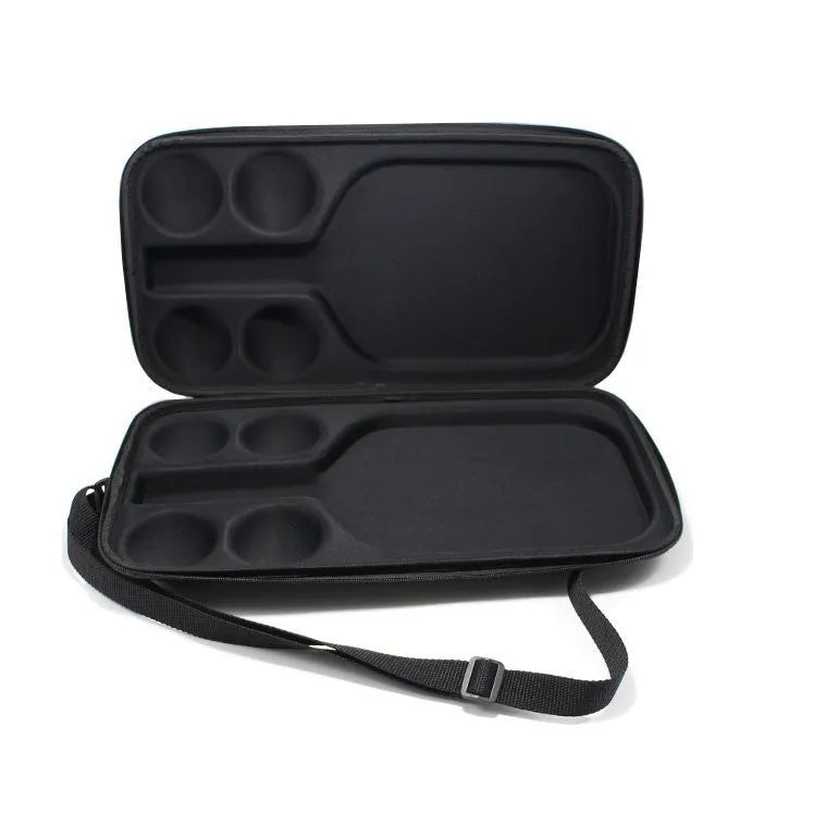Black EVA pickleball storage case with two shoulder straps, shown with racket and balls inside.
