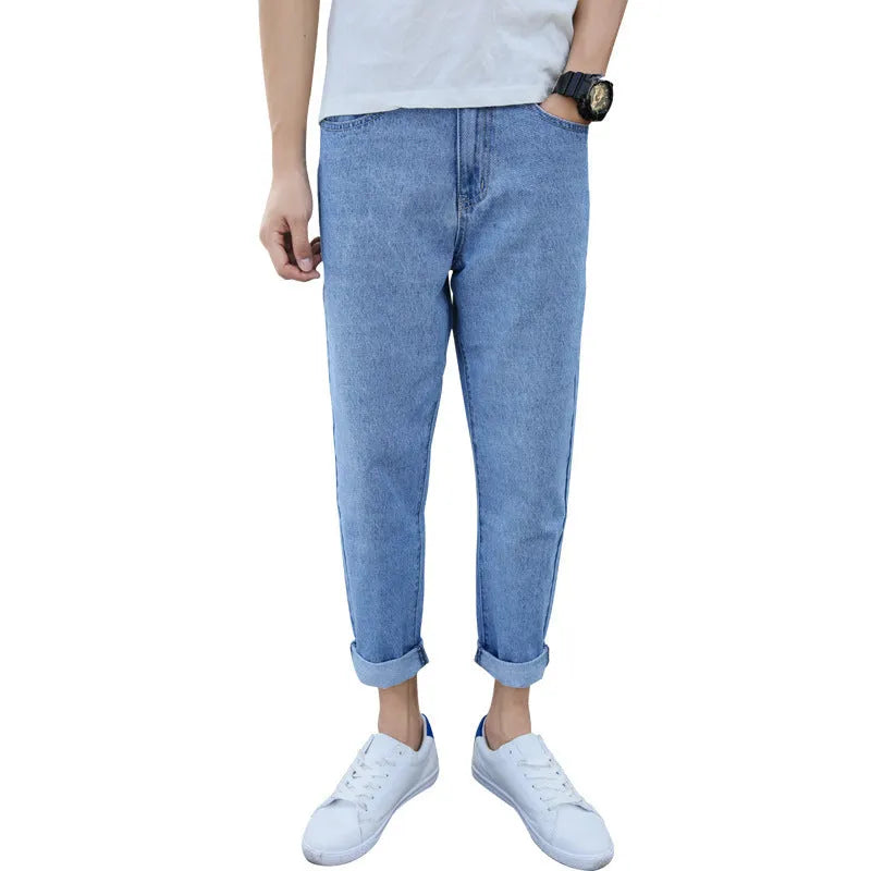 Men's loose fit straight leg jeans in black and blue colours showing harem style.