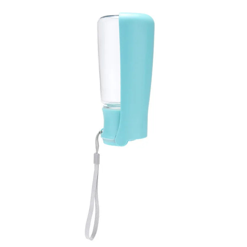 Blue foldable dog water bottle with dispenser cup extended, showing 550ml capacity marking.
