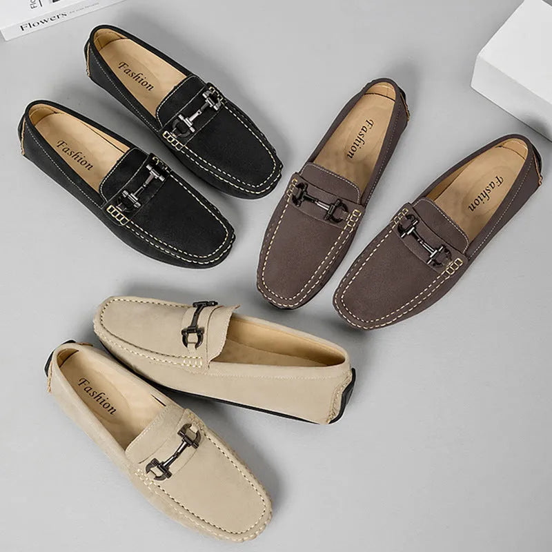 Men's beige leather casual loafers with a round toe and rubber sole.
